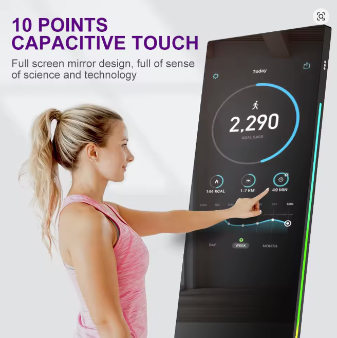 User interacting with 10-point capacitive touch on a smart fitness mirror